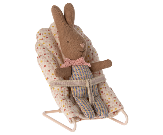 Maileg My Rabbit in rose and blue check sitting in a floral bouncer chair