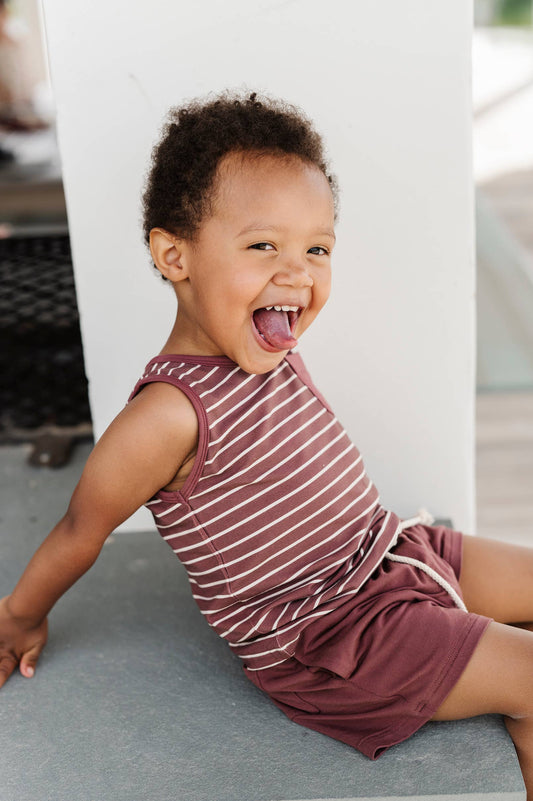 Boy’s Everyday short in Burgundy. Made with bamboo jersey, this light-weight pair of shorts has functional pockets on the sides and one in back. A great addition for summer!