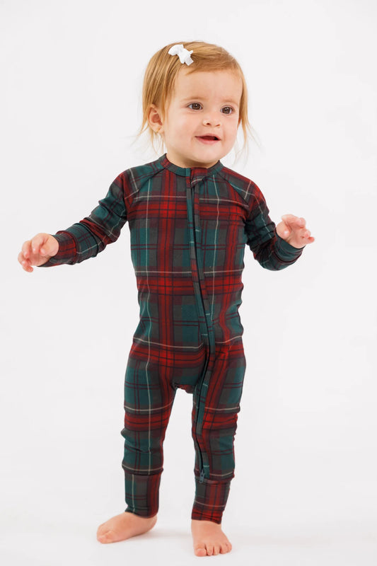 Toddler wearing the Holiday Heritage Plaid bamboo zipper romper