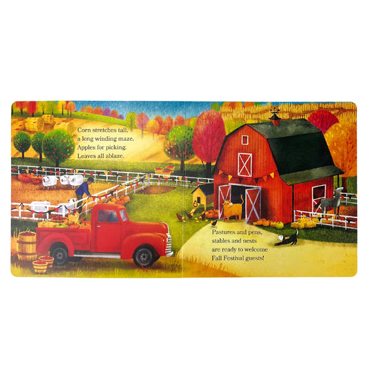 Inside spread of the Cottage Door Press Barn in Fall board book showing a red pickup truck arriving at the barn