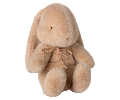 Plush bunny toy with a bow.