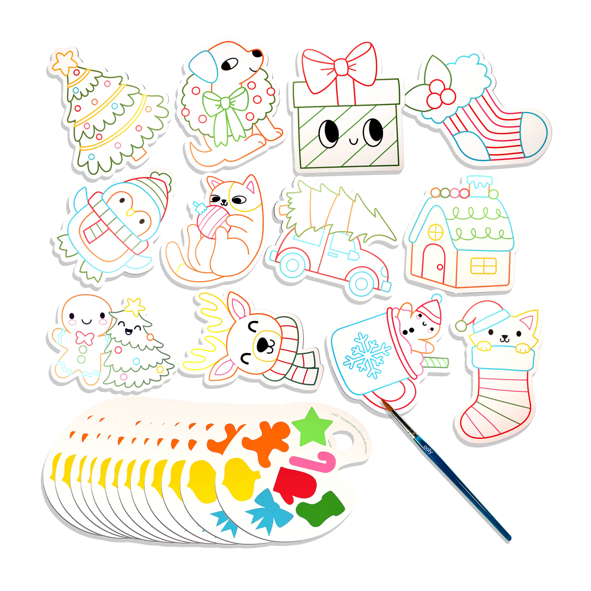 Contents of the Playful Painters Merry & Bright kit — die-cut Christmas cards, watercolour paints and a brush