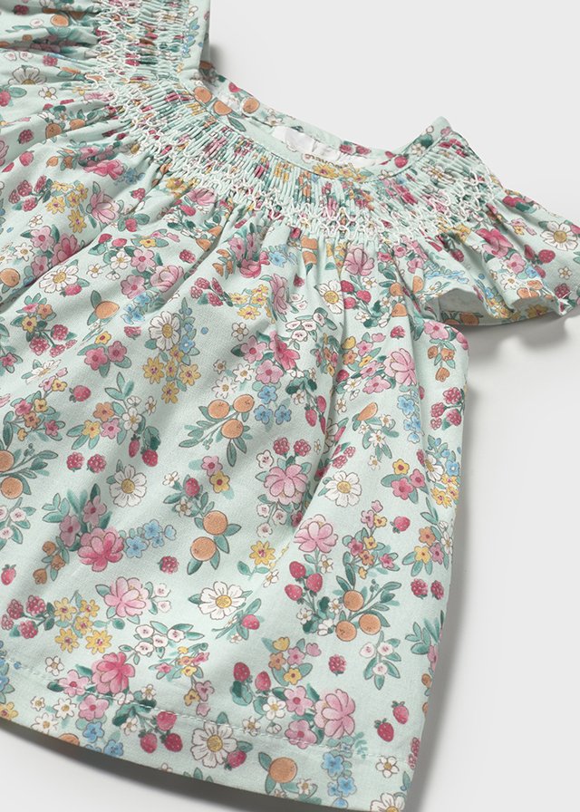 Close up of Newborn Floral Dress with Bloomers