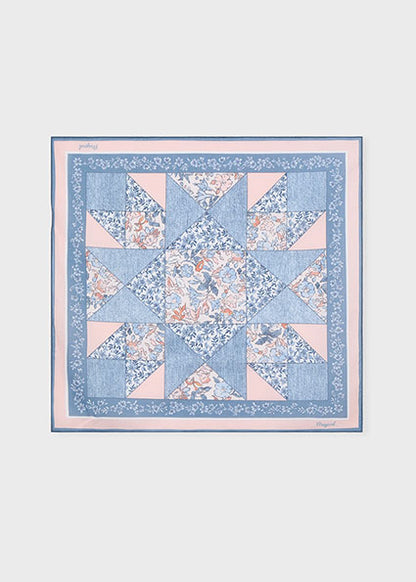 patchwork inspired bandana with floral pattern on a white background