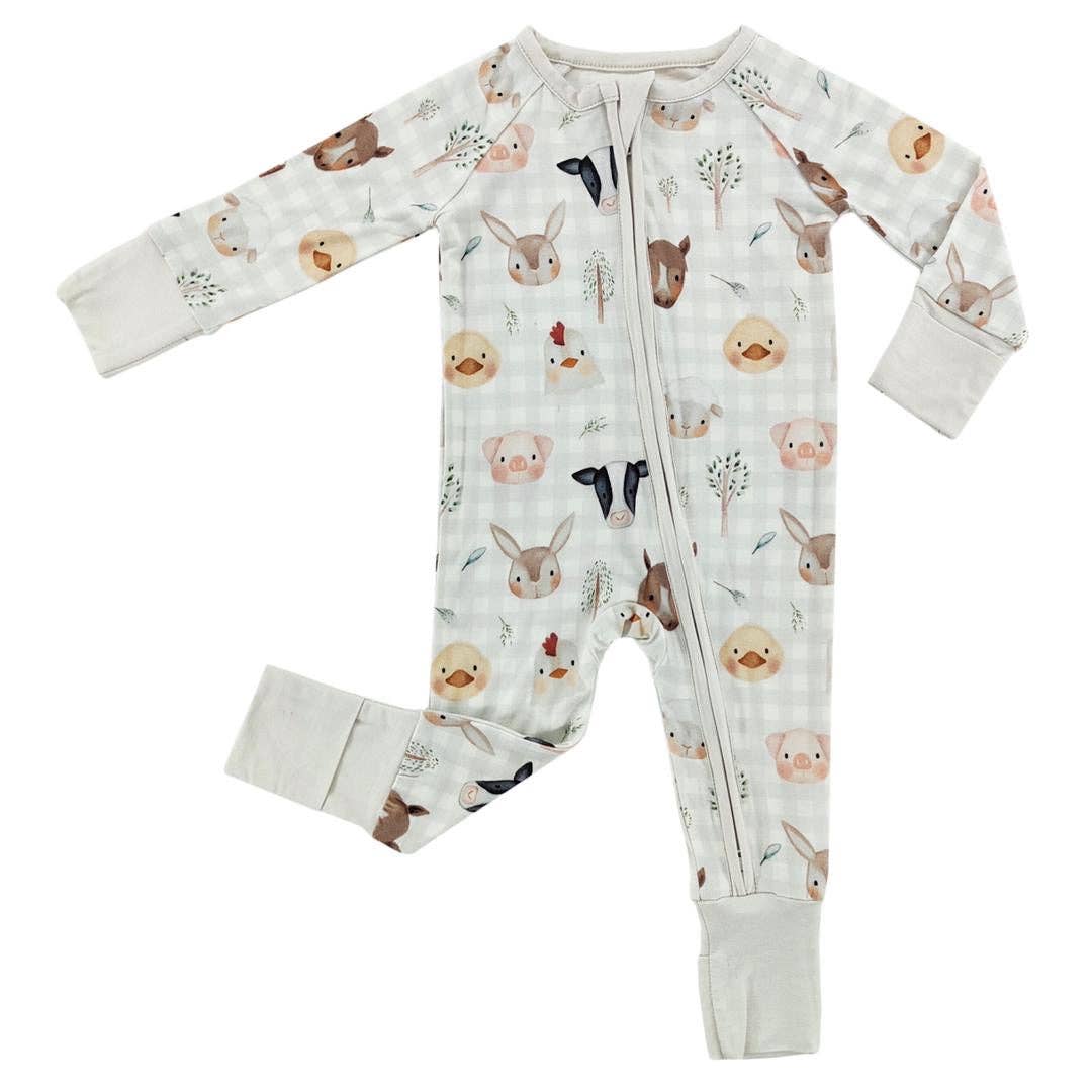 Baby onesie with animal print on a white background