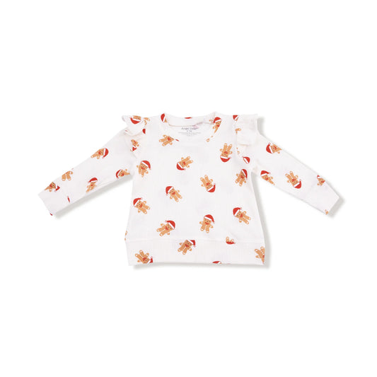 White long-sleeve shirt with gingerbread man pattern on a white background