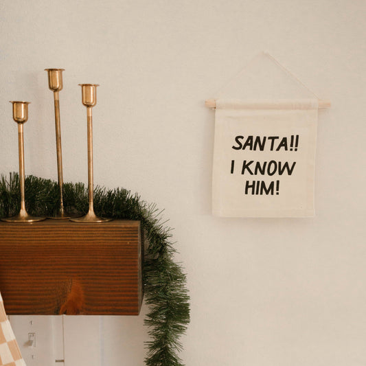 Santa I know him hang sign