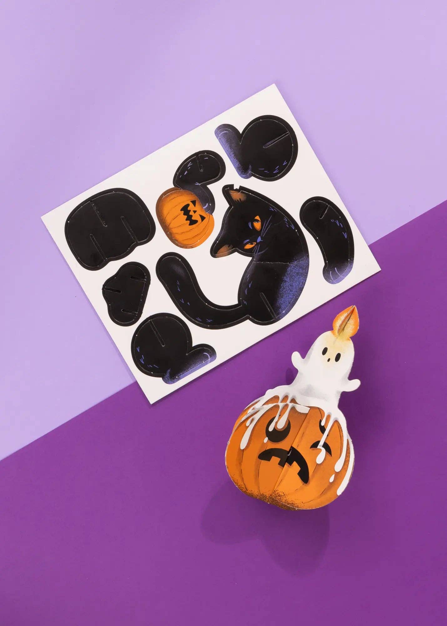 Halloween-themed stickers on a purple background