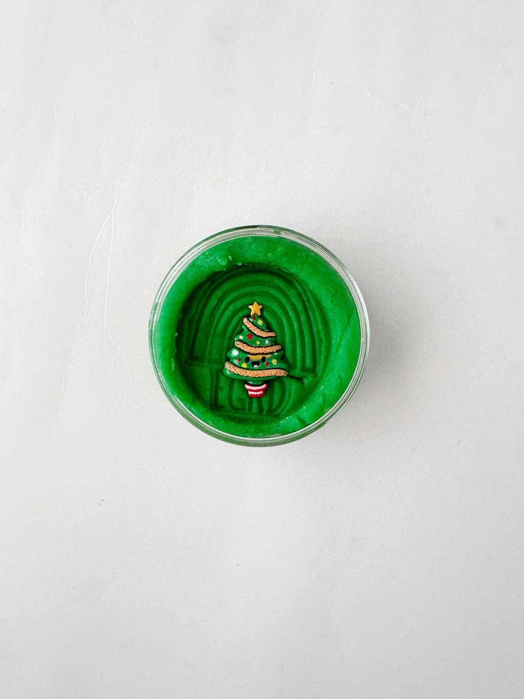 Oh Christmas Tree KidDough in a 4 ounce tub, green dough with a tree shape pressed on top