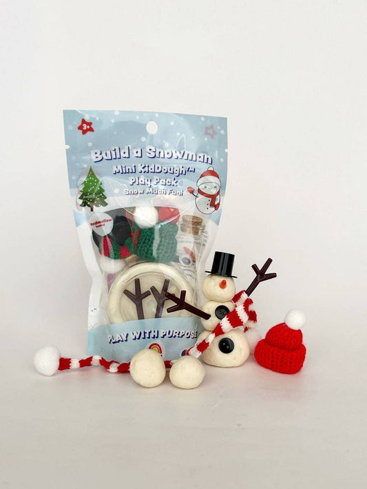 Build a Snowman mini KidDough play pack with the finished dough snowman, hat and carrot nose
