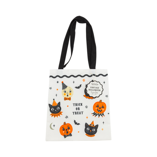 Halloween characters canvas tote bag with black handles, shown flat