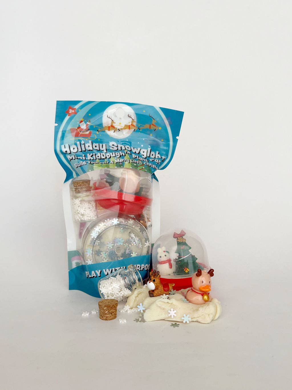 Holiday Snowglobe mini KidDough play pack with the dough snow globe and reindeer pieces