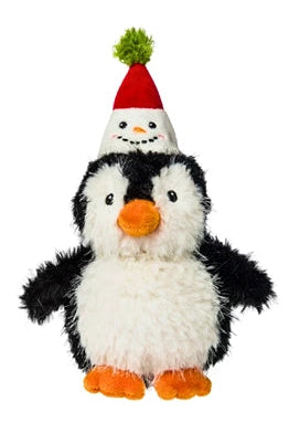 Black penguin plush toy wearing a festive snowman hat in red and white with a green pom pom. 