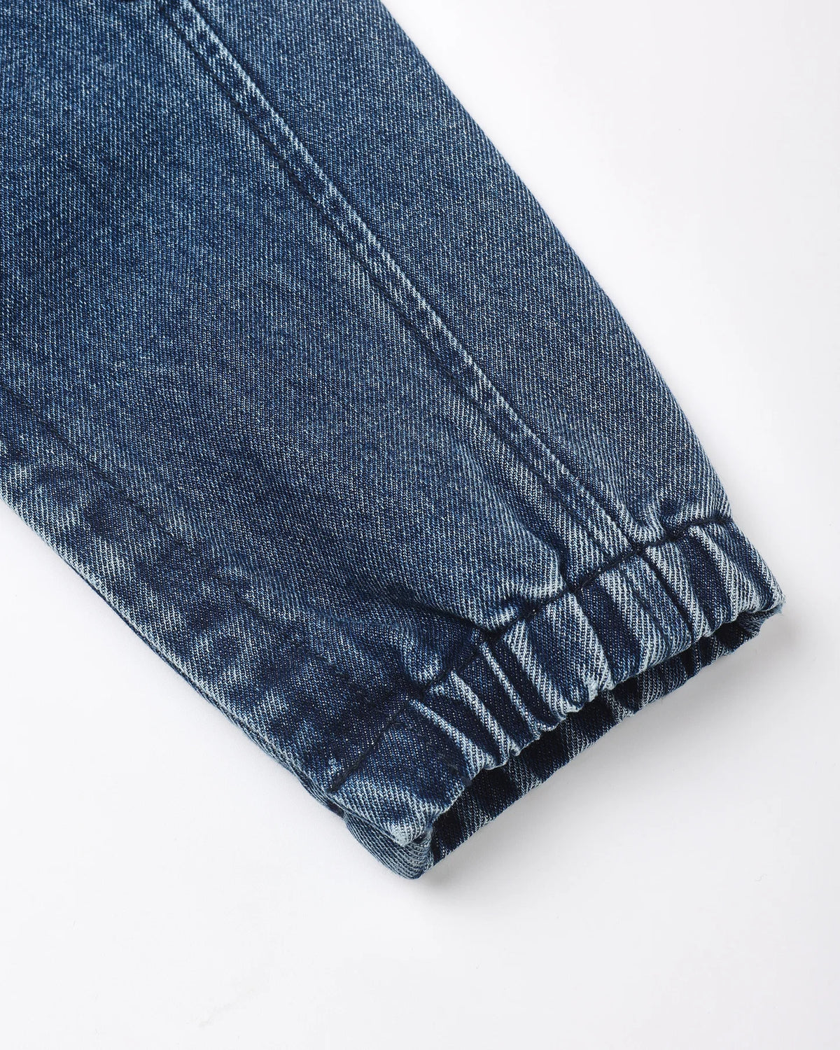 Rylee + Cru Cargo Baby Overall in indigo denim, closer view of the cotton denim baby overalls