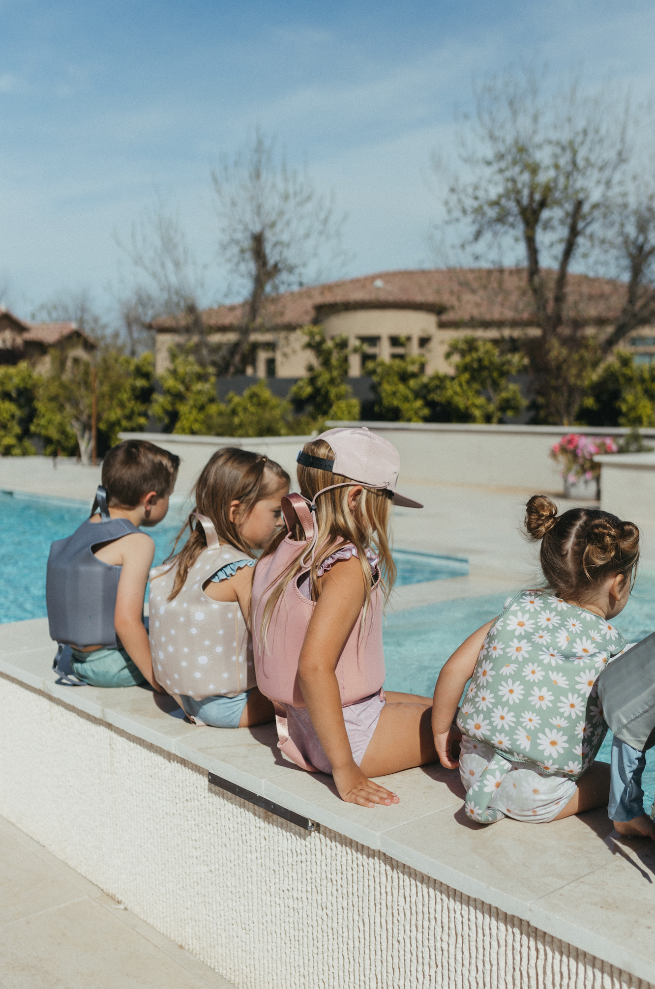 Kids wearing swim vests 