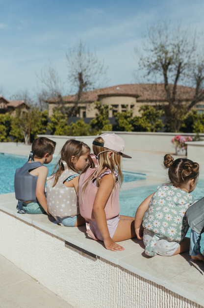 Kids wearing swim vests 