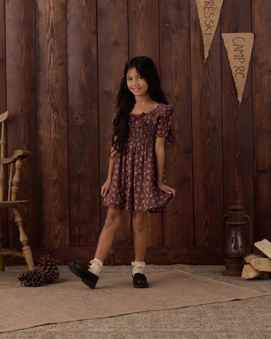 Rylee + Cru Dillon Dress in Iris Mulberry, a long-sleeve floral girls' dress in muted brown tones