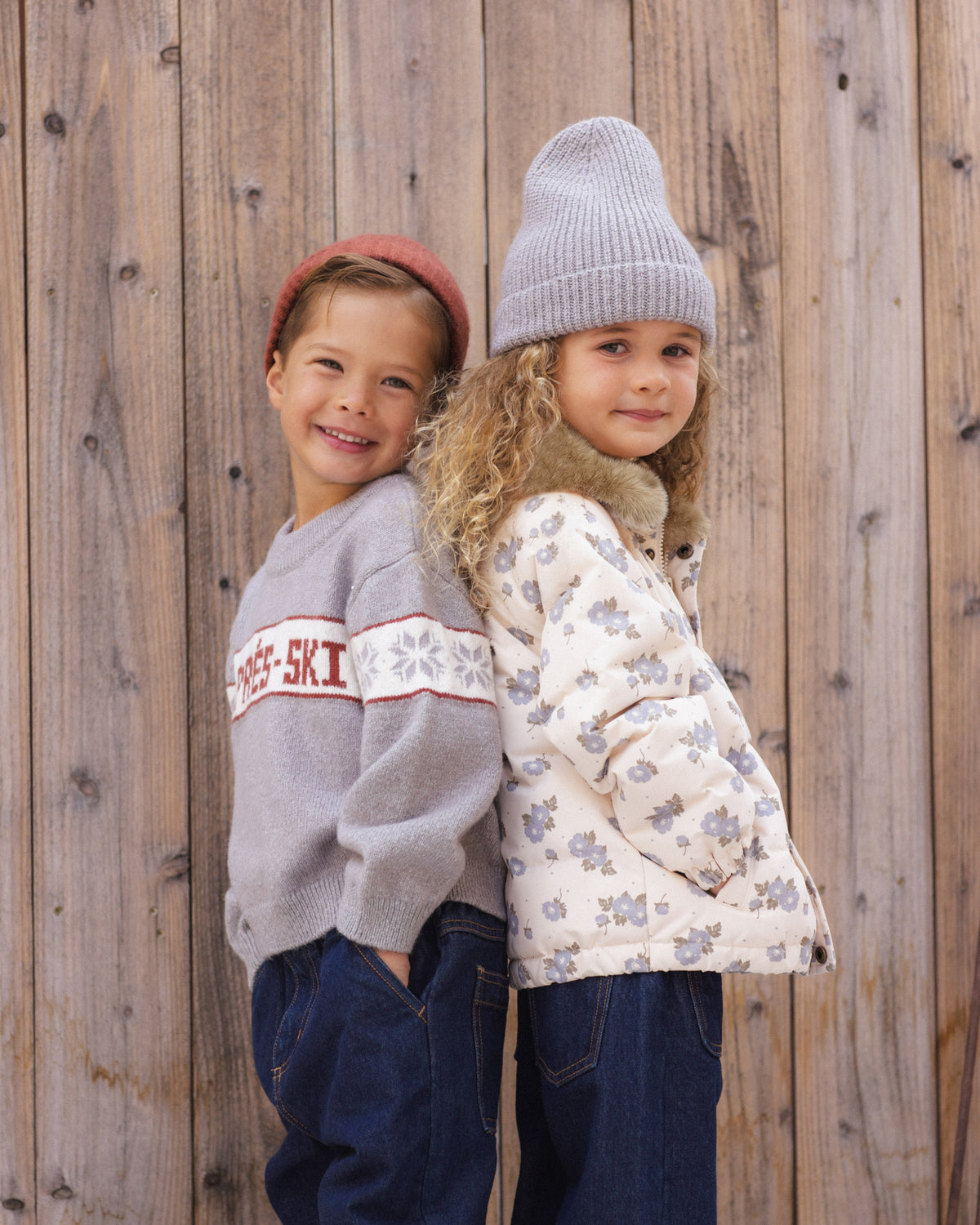 Two girls smiling together in the snow, one in the Rylee + Cru Reagan Apres Ski sweater