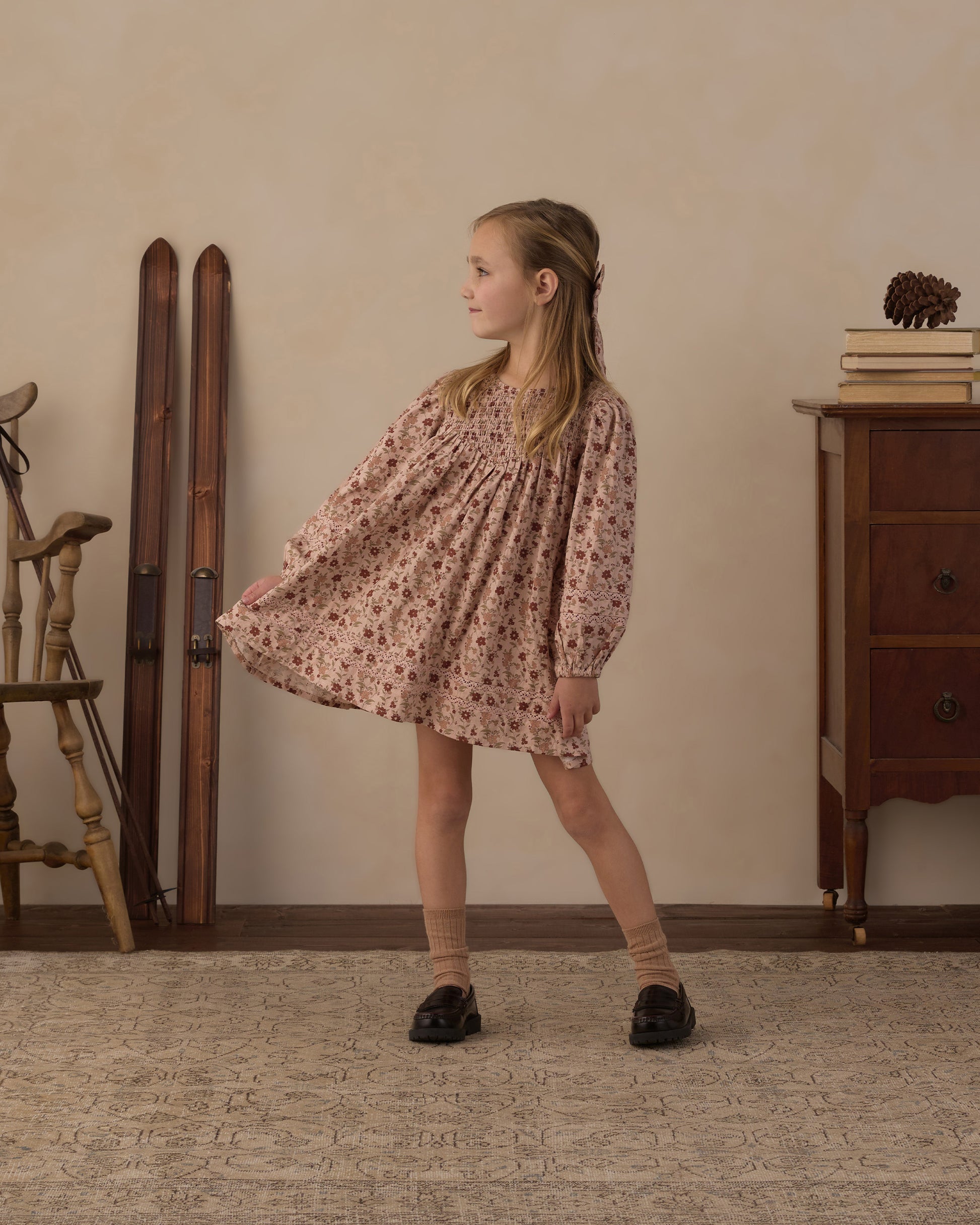 Girl twirling in the Rylee + Cru Selene dress, showing the full skirt