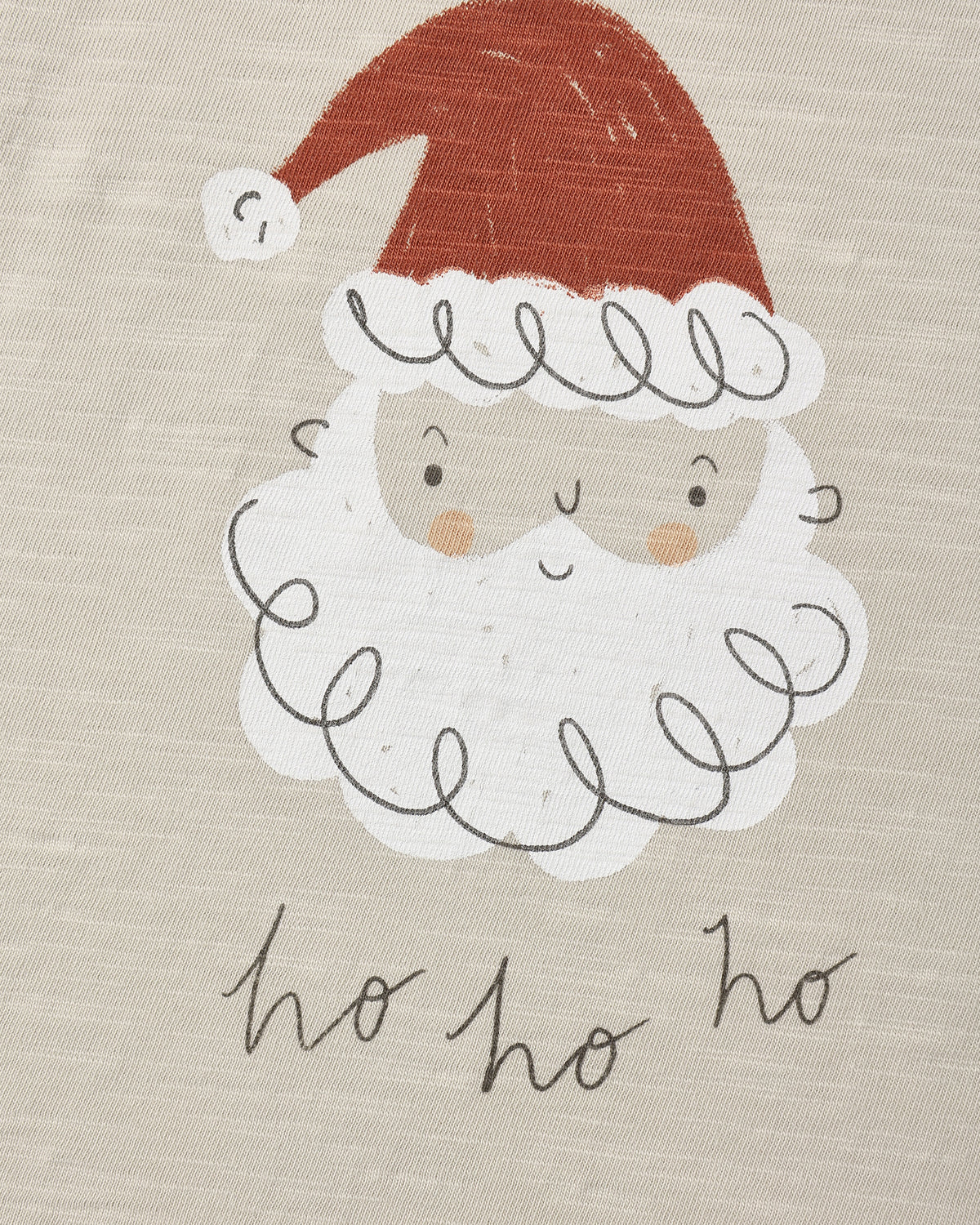 Close view of the Santa face graphic and ho ho ho script on the Rylee + Cru long sleeve tee