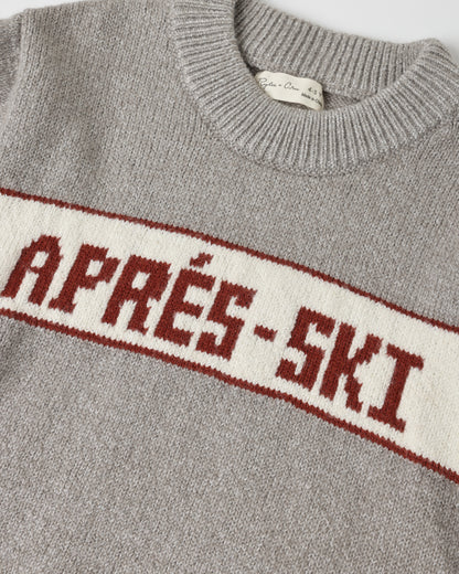 Close view of the APRES-SKI intarsia lettering knitted into the Rylee + Cru Reagan sweater