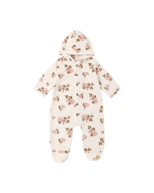 Rylee + Cru Fleece Jumpsuit in Rose Garden laid flat, cream fleece with a hood and footed legs