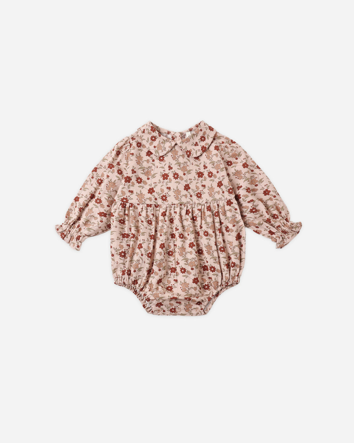 Rylee + Cru Cora Romper laid flat, small red and blush floral print on beige with a ruffled collar and elastic leg openings