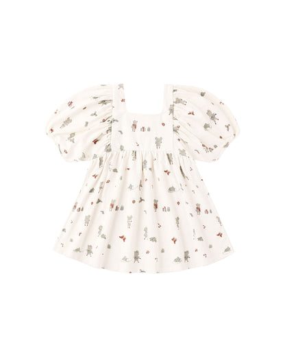 Rylee + Cru Brea dress in the holiday mouse print, flat lay front view showing the puff sleeves and smocked neckline