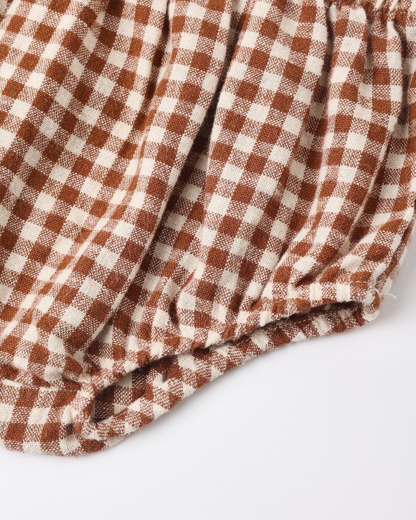 Detail of the elasticated leg opening on the brick check Nellie bloomers