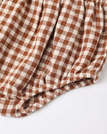 Detail of the elasticated leg opening on the brick check Nellie bloomers