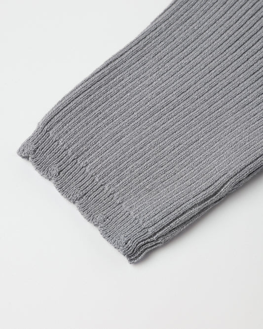 Fabric detail of the Rylee + Cru dusty blue scallop tee showing the ribbed knit and scalloped edge