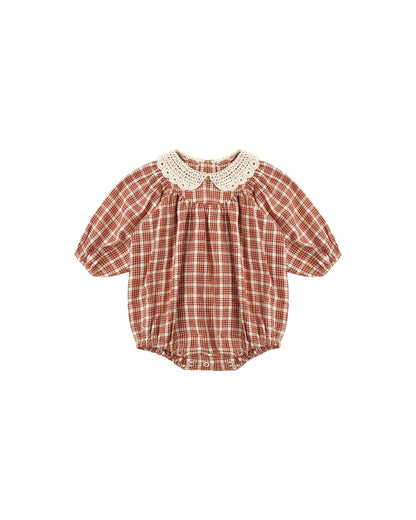 Rylee + Cru Heidi romper in vintage plaid with a lace collar, flat lay front view