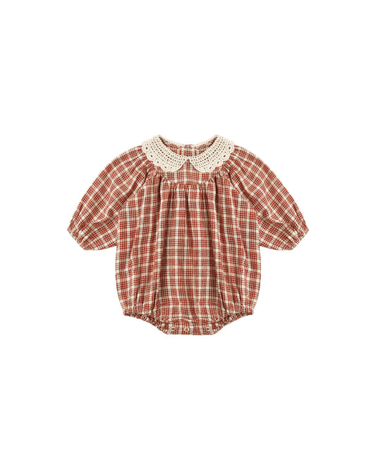 Rylee + Cru Heidi romper in vintage plaid with a lace collar, flat lay front view