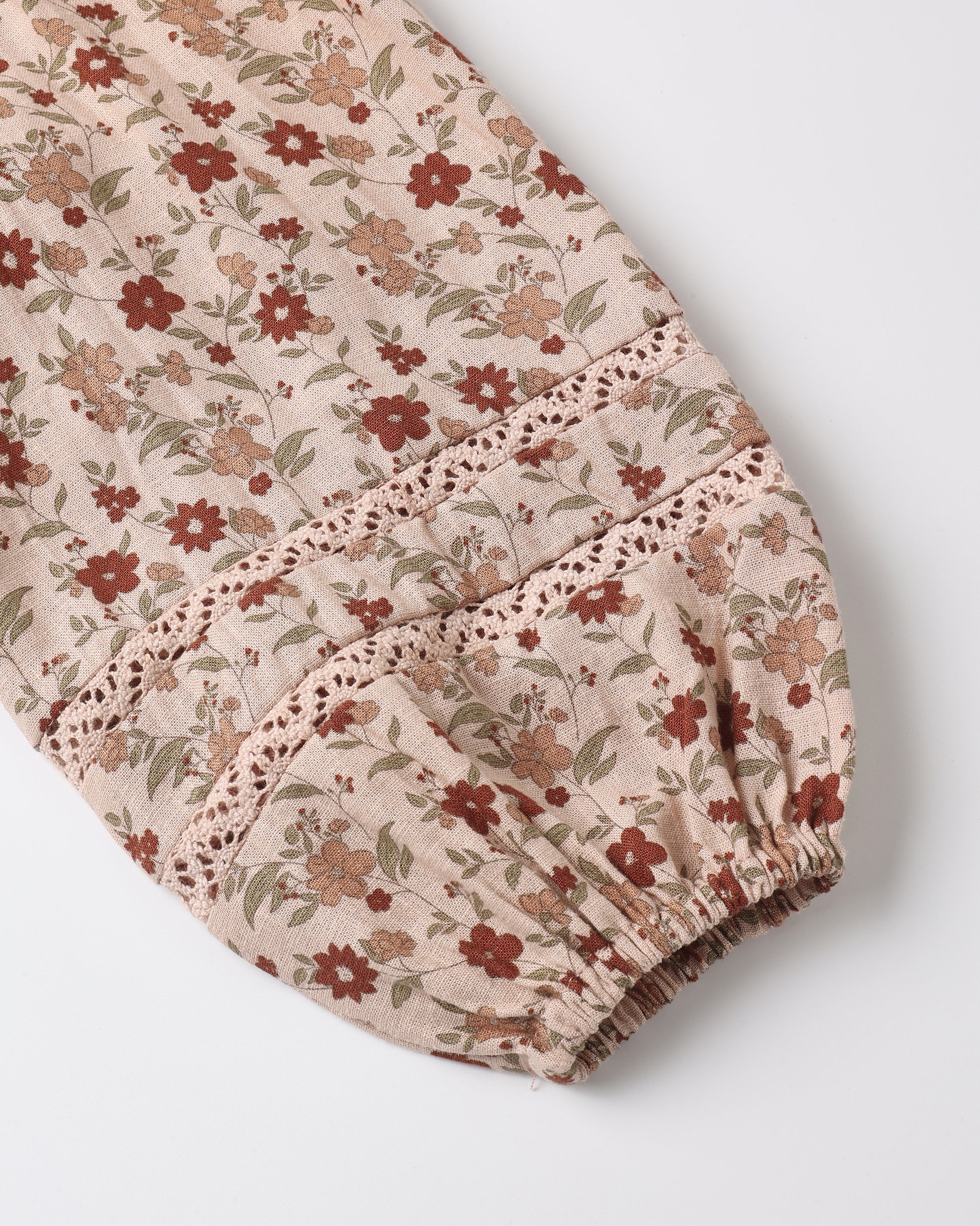 Detail of the pink floral print on the Rylee + Cru Selene dress