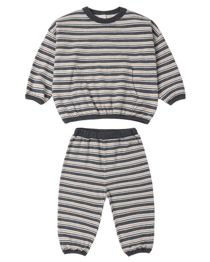 Striped sweatshirt and pants set on a white background