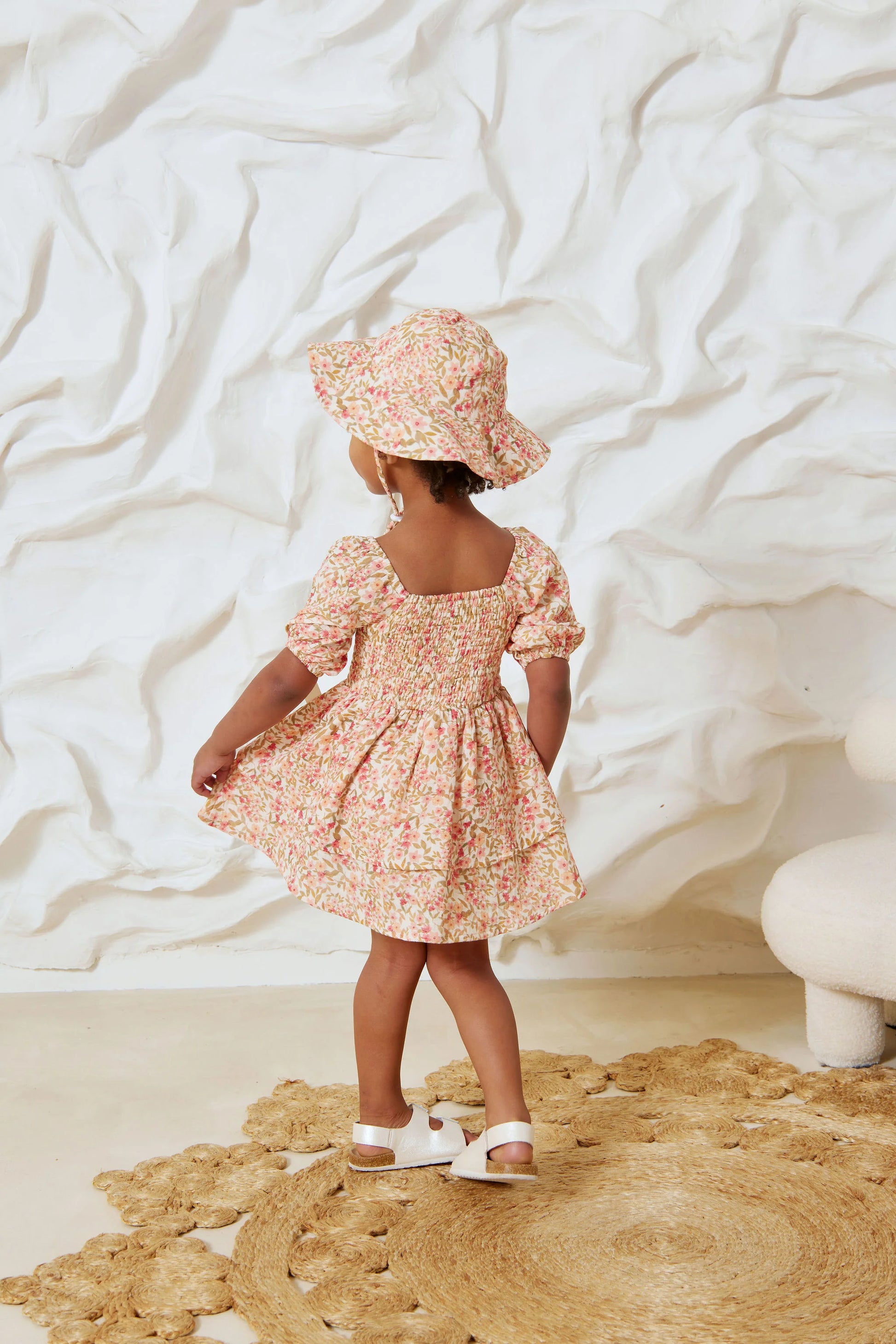 Girl wearing Spring Blossom Sun Hat and Spring Blossom Shirred Dress