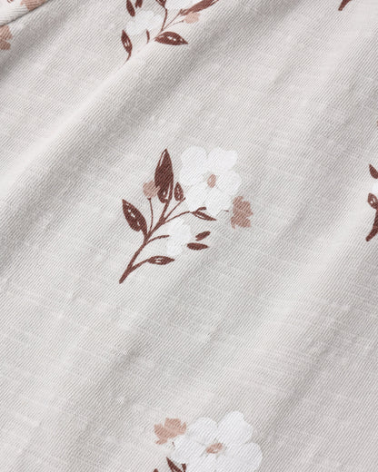 Close view of the Wildflower print fabric, small brown and cream flowers on a soft ground
