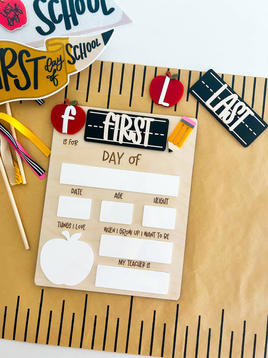 Back-to-school-themed whiteboard with cutout letters and stationery items on a wooden surface.