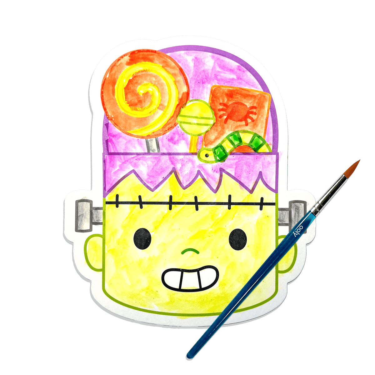 A painted Frankenstein card from the Playful Painters Trick or Treat kit with the paintbrush beside it