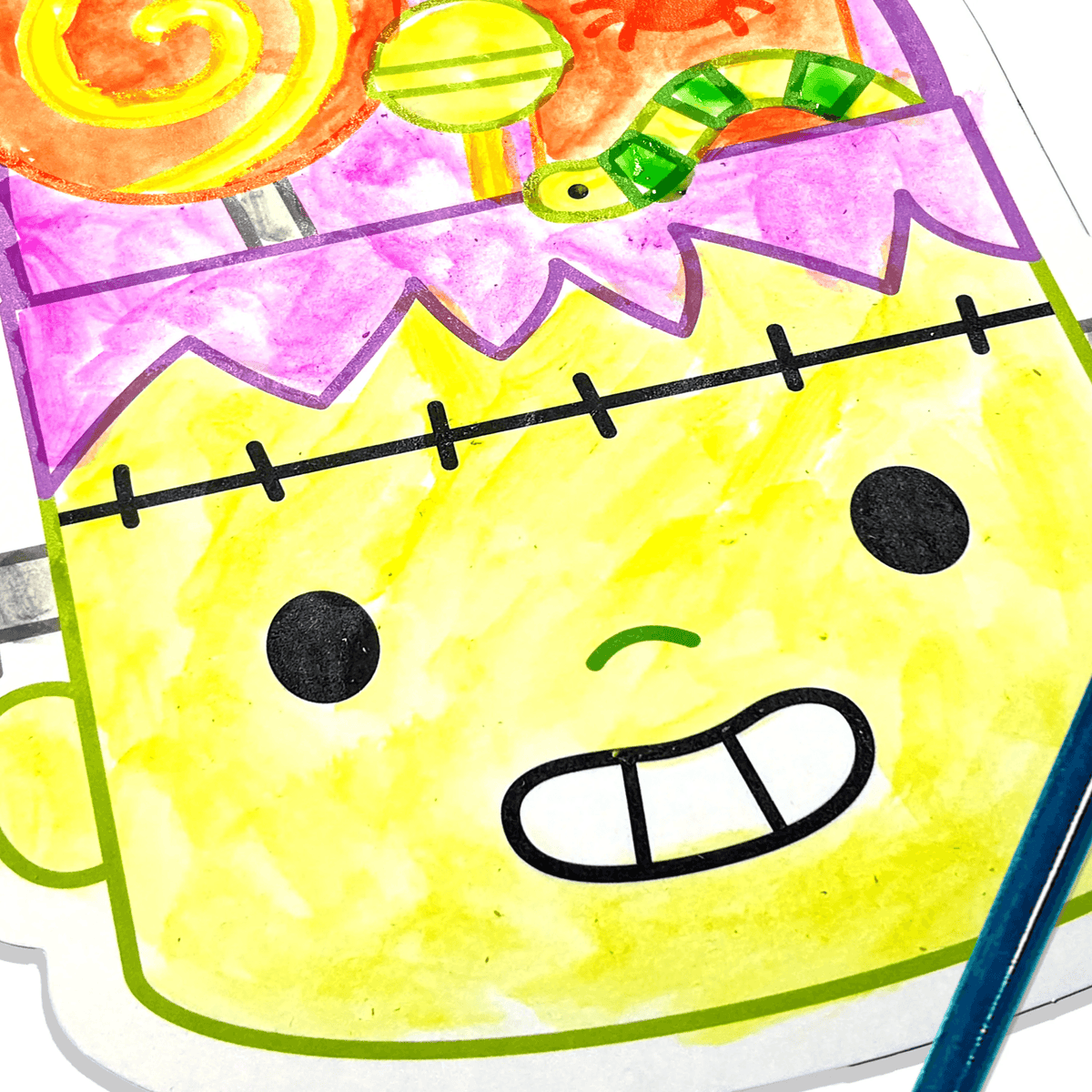 Close view of a finished Frankenstein watercolour card from the Playful Painters Halloween kit