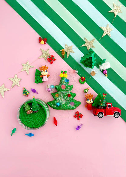 Trim a Tree KidDough play kit with the dough tree decorated with stars, gifts and a red truck