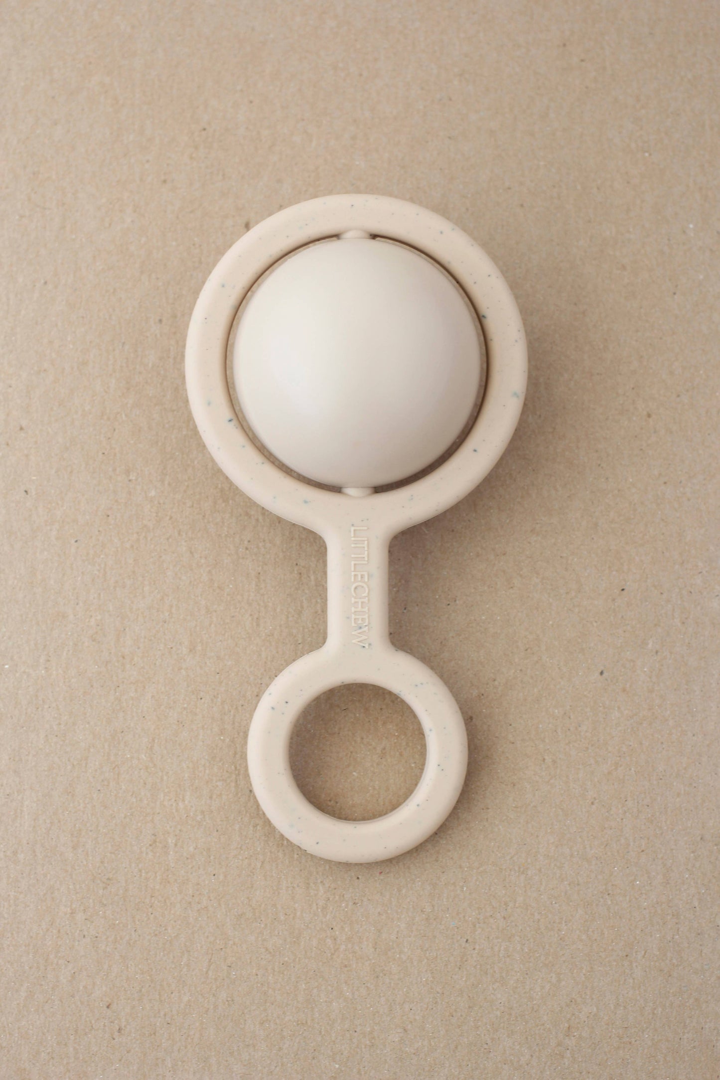 Ora Rattle Toy in Beige