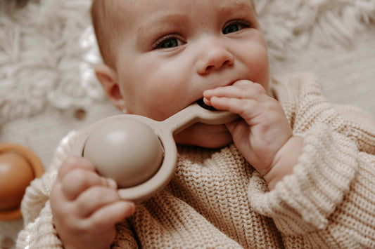 Ora Rattle Toy in Beige